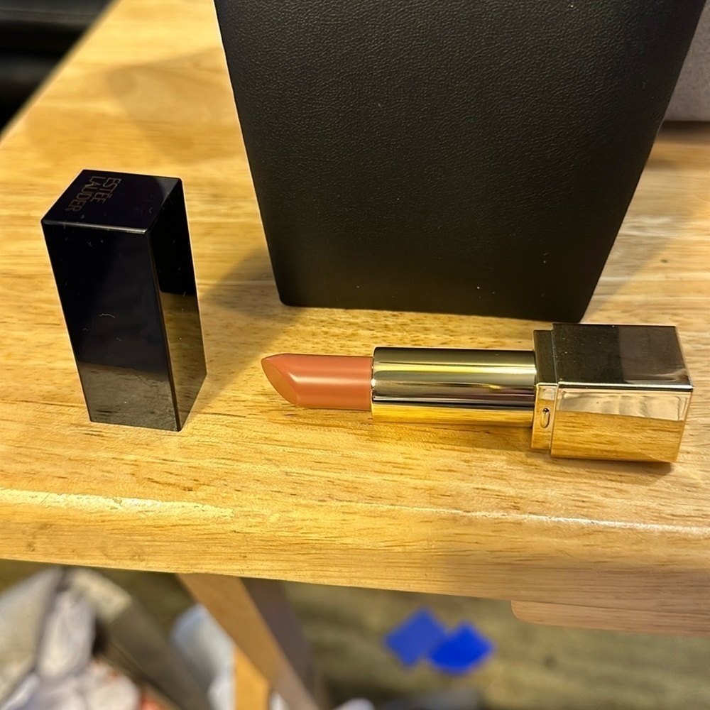 Estée Lauder lipstick. Color is irresistible ivory. Of course brand new.​​​